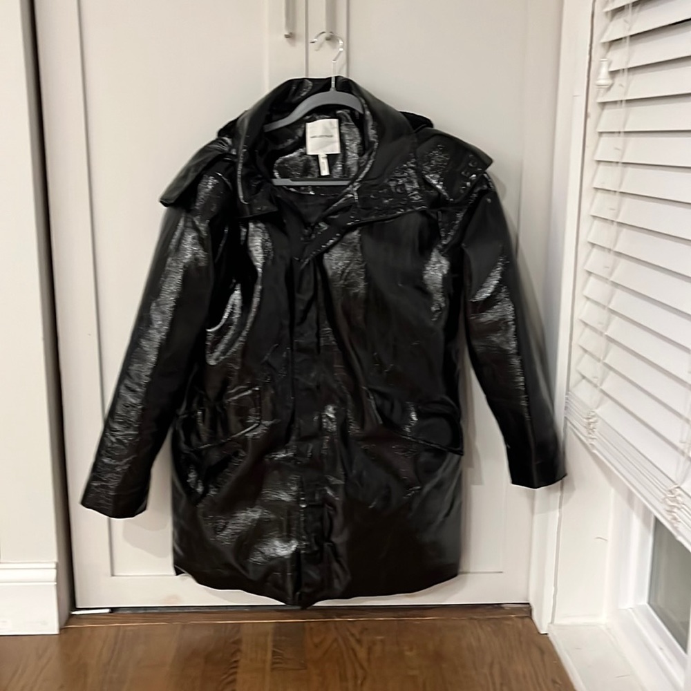 Avec Les Filles  Black rain coat with zip off for lined hood. Size Large. New